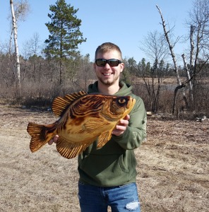 Josh Severtson pictured with his locally "caught" massive crappie.