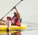 man in kayak with daughter