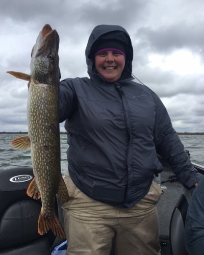 woman fishing in park rapids