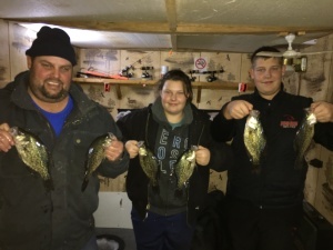 ice fishing crappies family in house